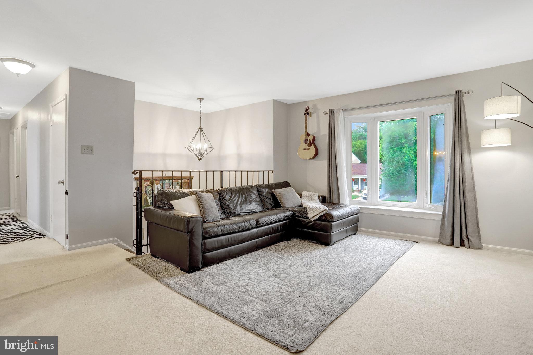 4518 Flintstone Road Alexandria, VA 22306 - Photo 10 of 62 a living room with furniture and a window