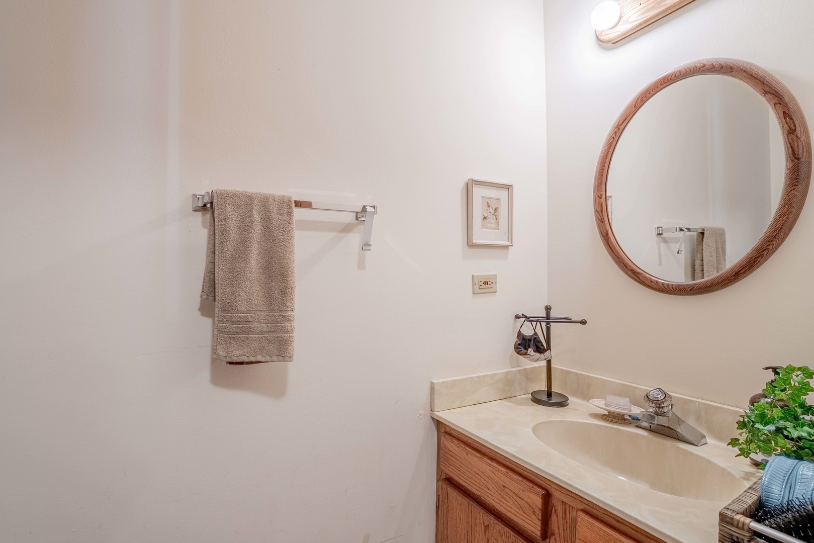 3632 Harlem Avenue Riverside, IL 60546 - Photo 11 of 26 a bathroom with a sink and a mirror