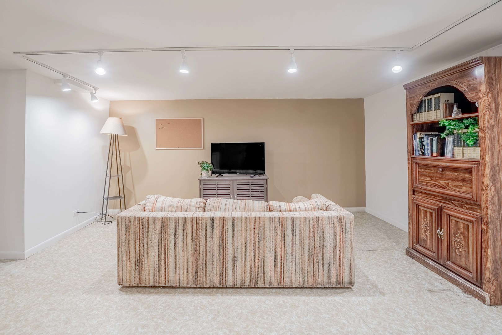 3632 Harlem Avenue Riverside, IL 60546 - Photo 14 of 26 a living room with furniture and a flat screen tv