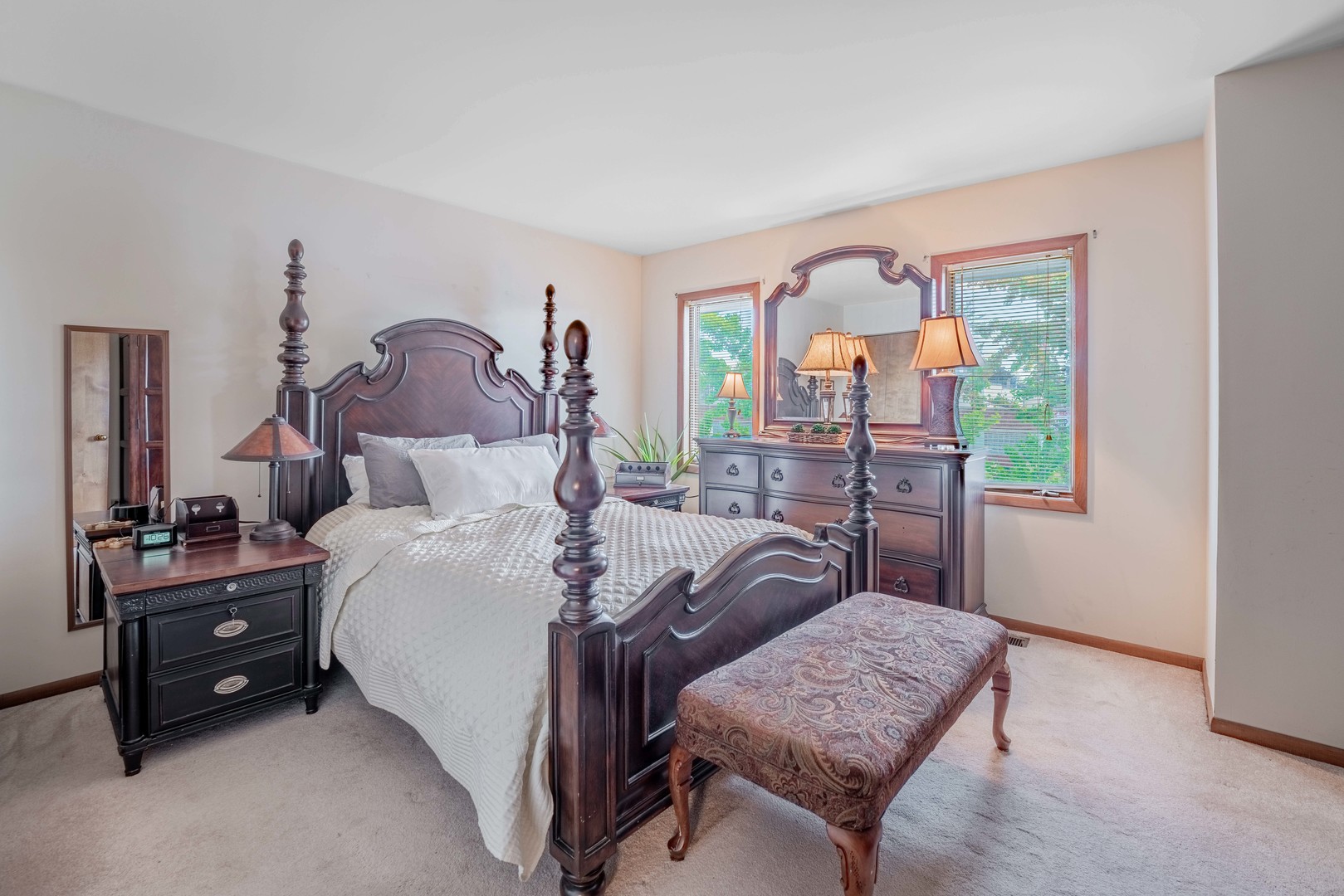 3632 Harlem Avenue Riverside, IL 60546 - Photo 20 of 26 a bed room with a bed and a painting on the wall