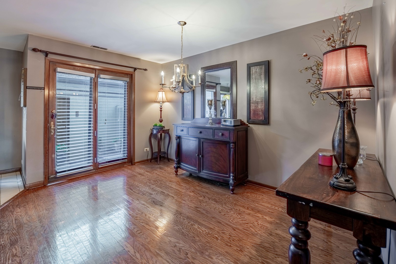 3632 Harlem Avenue Riverside, IL 60546 - Photo 5 of 26 a view of a workspace with furniture and chandelier