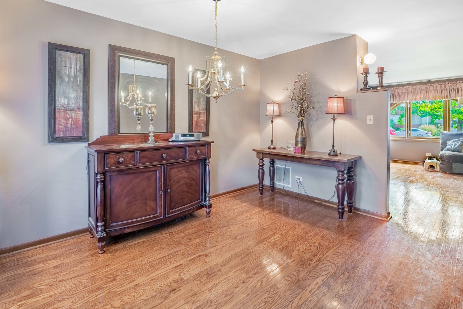 3632 Harlem Avenue Riverside, IL 60546 - Photo 6 of 26 a living room with furniture and a chandelier
