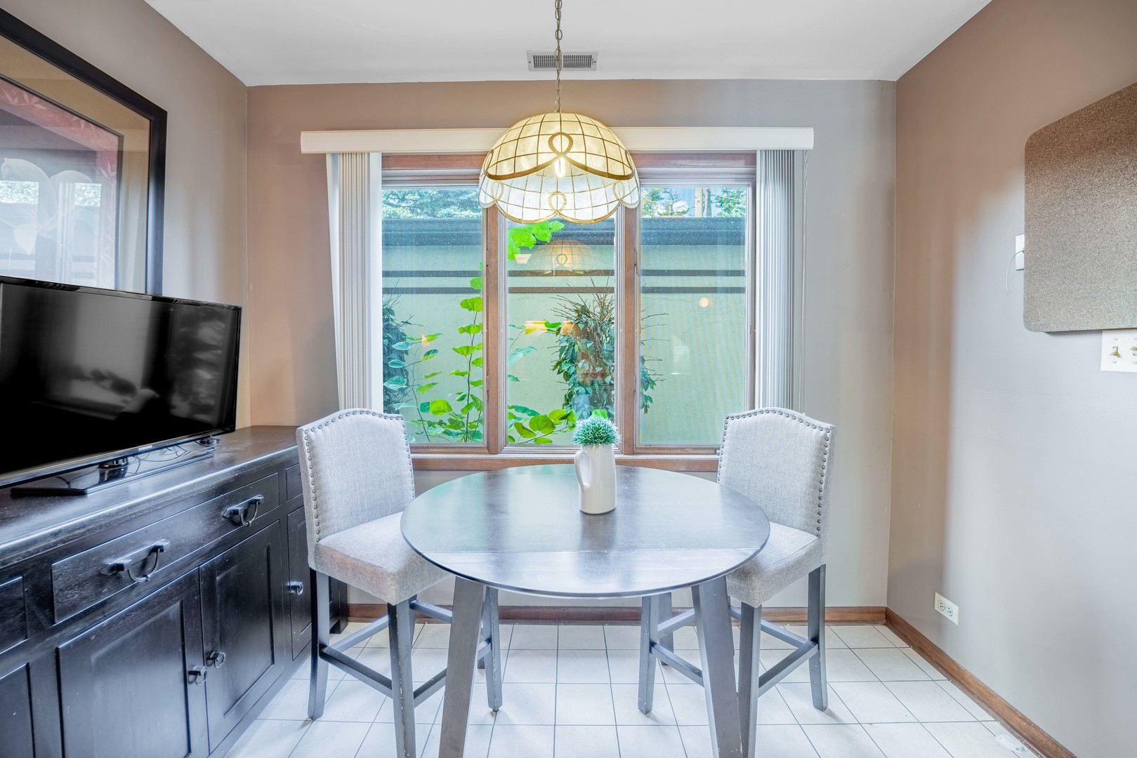 3632 Harlem Avenue Riverside, IL 60546 - Photo 8 of 26 a view of a dining room with furniture window and outside view