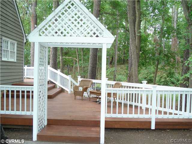 4025 Poplar Grove Road Midlothian, VA 23112 - Photo 12 of 12 a view of a chair and table in the deck