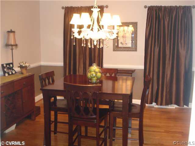 4025 Poplar Grove Road Midlothian, VA 23112 - Photo 5 of 12 a dining room with furniture and window
