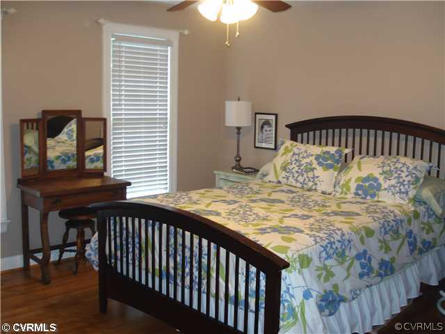 4025 Poplar Grove Road Midlothian, VA 23112 - Photo 9 of 12 a bedroom with a bed and a window