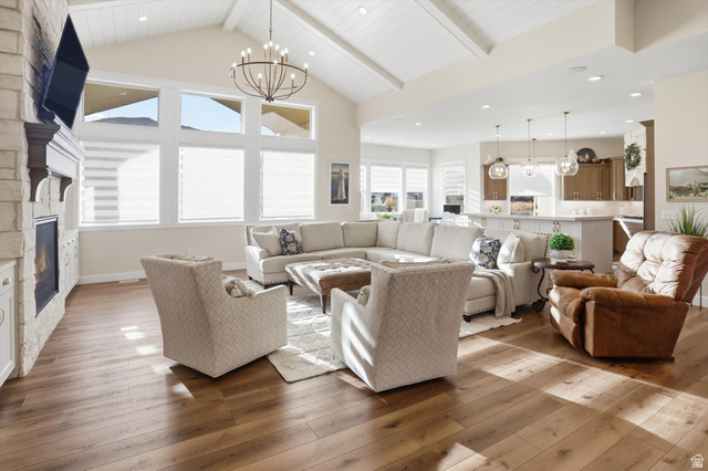 534 East Fish Hatchery Road Mantua, UT 84324 - Photo 10 of 87 Living area featuring a fireplace, suspended lighting, and hardwood / wood-style floors