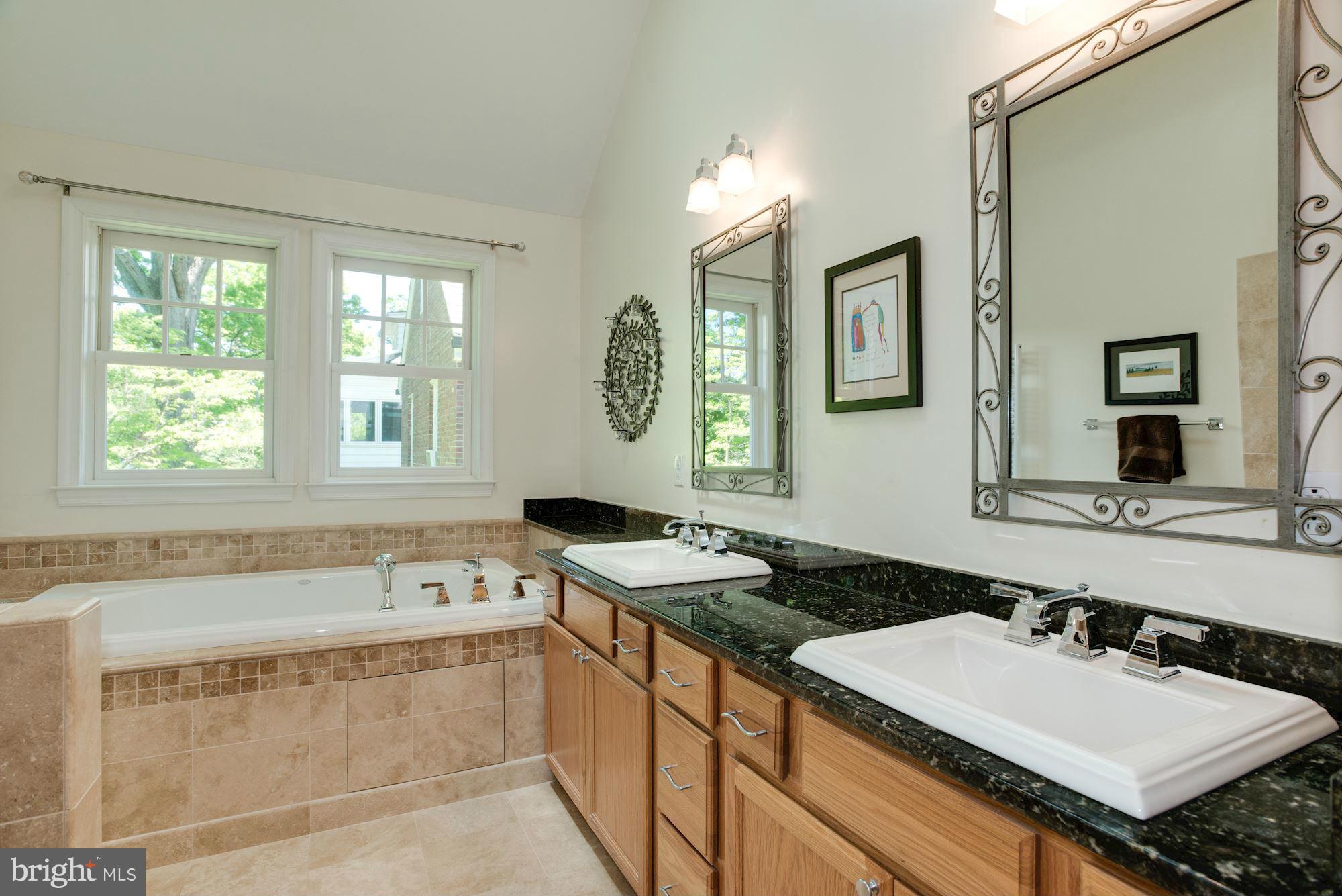 6224 30th Street Northwest Washington, DC 20015 - Photo 22 of 30 a bathroom with a sink and a bathtub