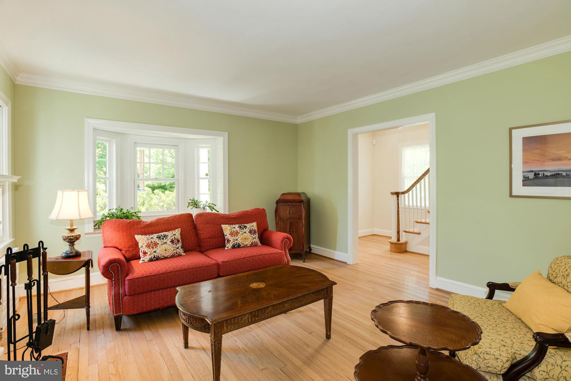 6224 30th Street Northwest Washington, DC 20015 - Photo 5 of 30 a living room with furniture and a wooden floor