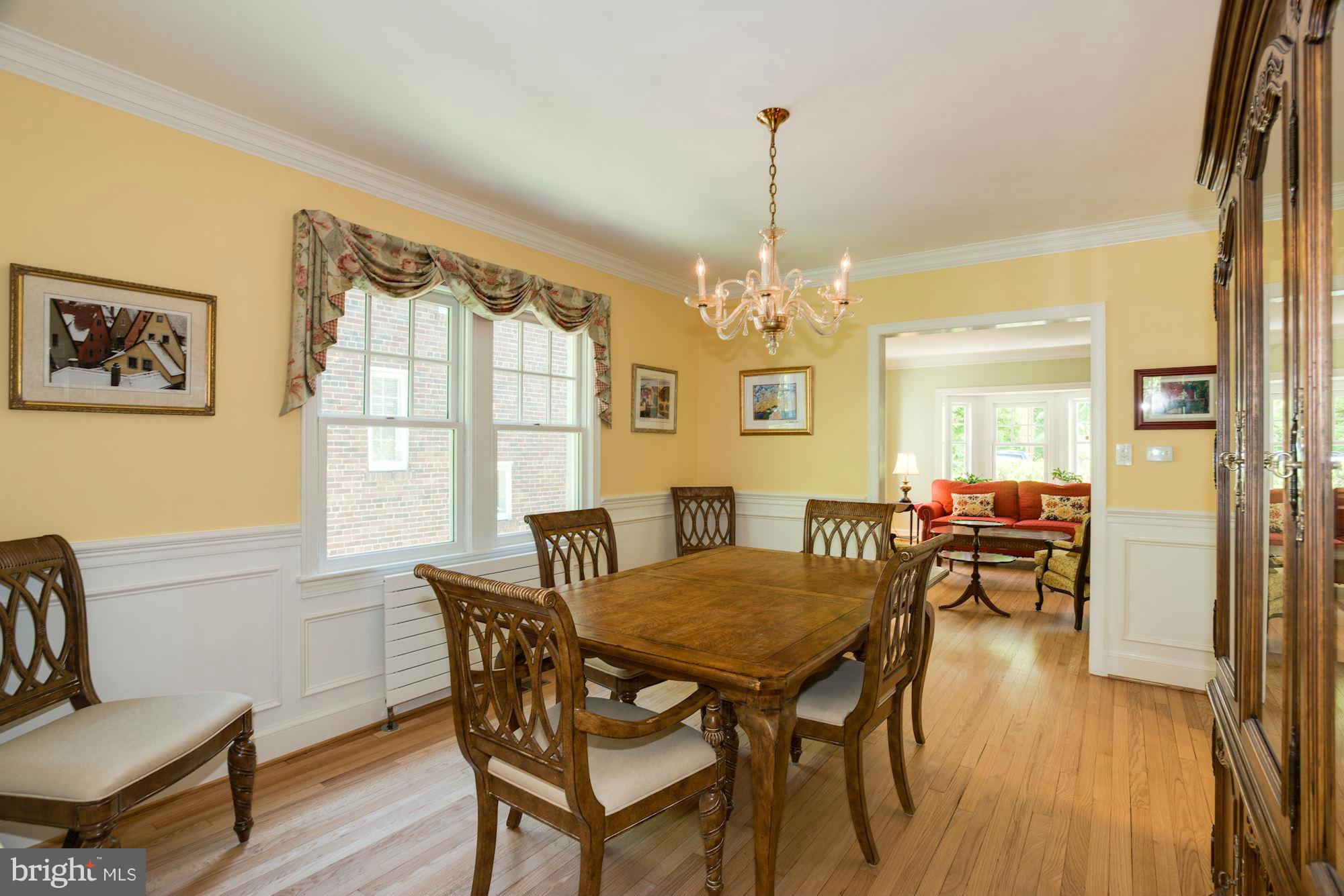 6224 30th Street Northwest Washington, DC 20015 - Photo 6 of 30 a view of a dining room with furniture window and wooden floor