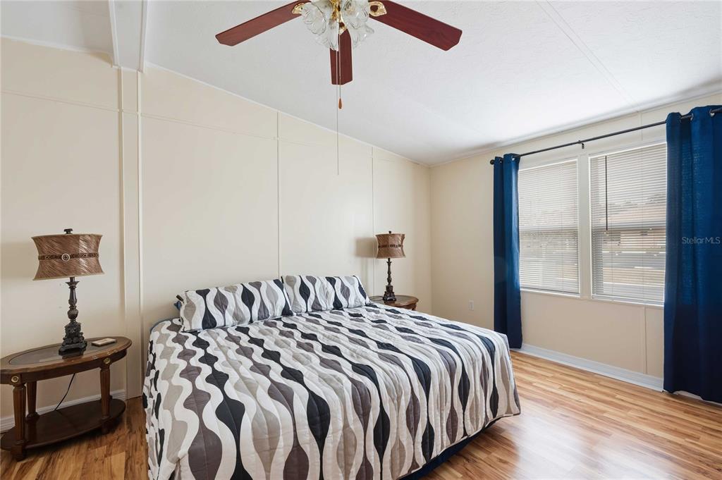 3125 Briar Street Wesley Chapel, FL 33543 - Photo 14 of 42 a bedroom with a bed and a window