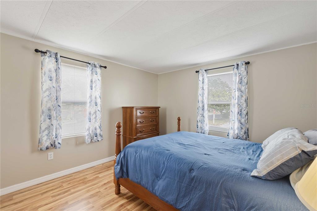 3125 Briar Street Wesley Chapel, FL 33543 - Photo 20 of 42 a bedroom with a bed and a window