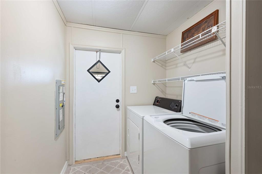 3125 Briar Street Wesley Chapel, FL 33543 - Photo 25 of 42 a utility room with dryer and washer