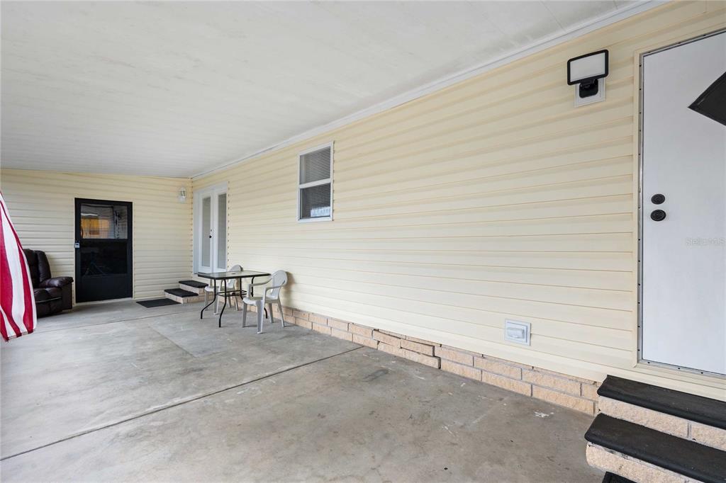 3125 Briar Street Wesley Chapel, FL 33543 - Photo 27 of 42 a view of an empty room with furniture and a window