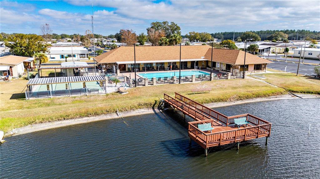 3125 Briar Street Wesley Chapel, FL 33543 - Photo 34 of 42 an outdoor space with swimming pool and seating
