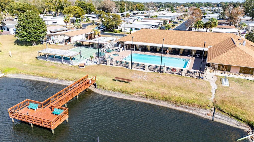 3125 Briar Street Wesley Chapel, FL 33543 - Photo 36 of 42 an aerial view of a house with a swimming pool outdoor seating and yard