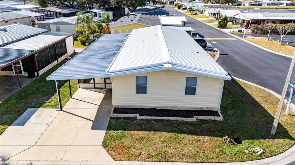 3125 Briar Street Wesley Chapel, FL 33543 - Photo 42 of 42 a aerial view of a house with swimming pool