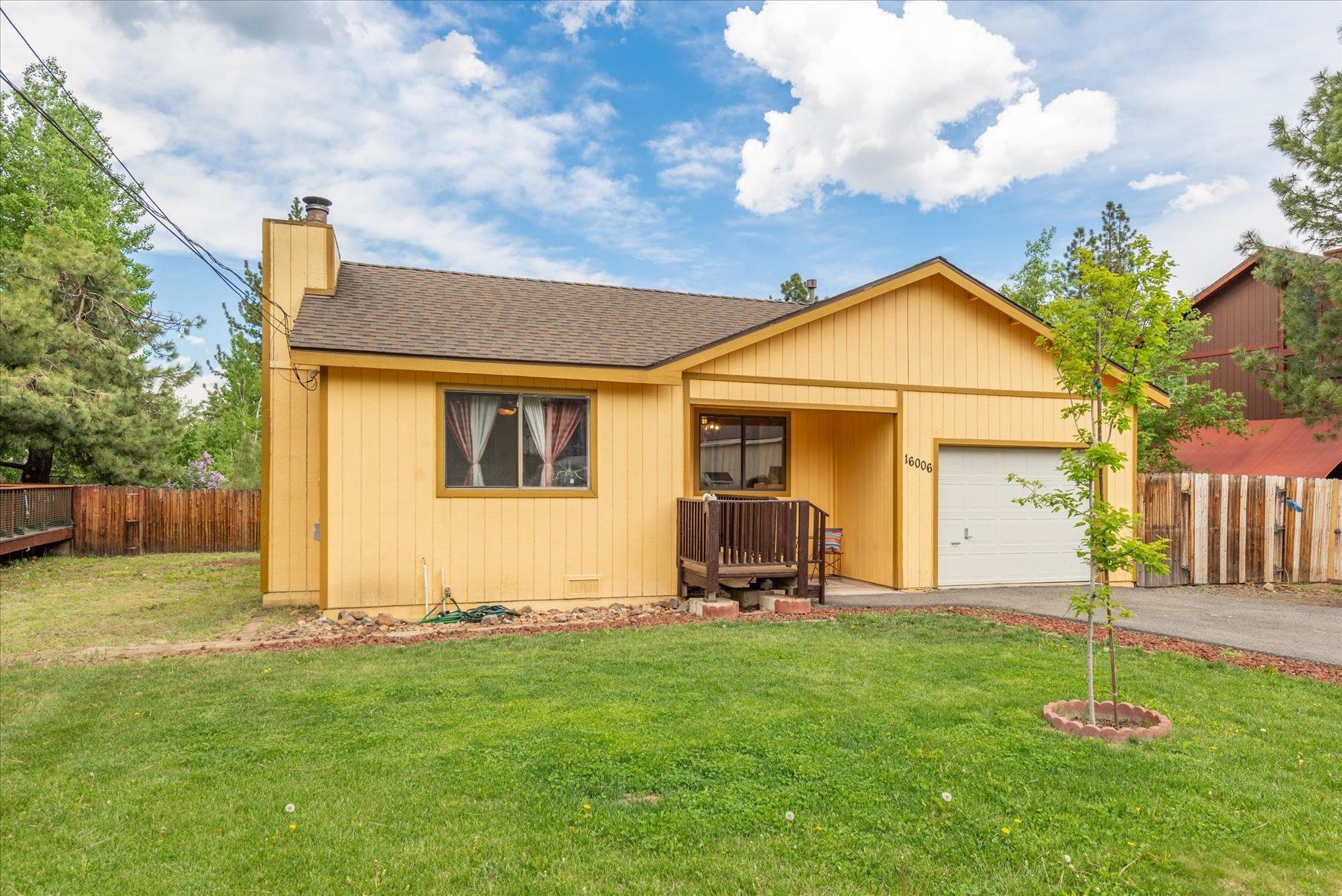 16006 Rolands Way Truckee, CA 96161 - Photo 1 of 19 a front view of a house with garden