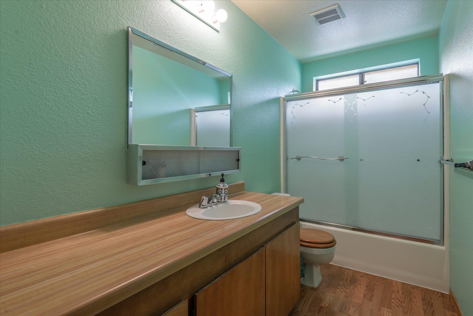 16006 Rolands Way Truckee, CA 96161 - Photo 12 of 19 a bathroom with a sink a toilet and shower