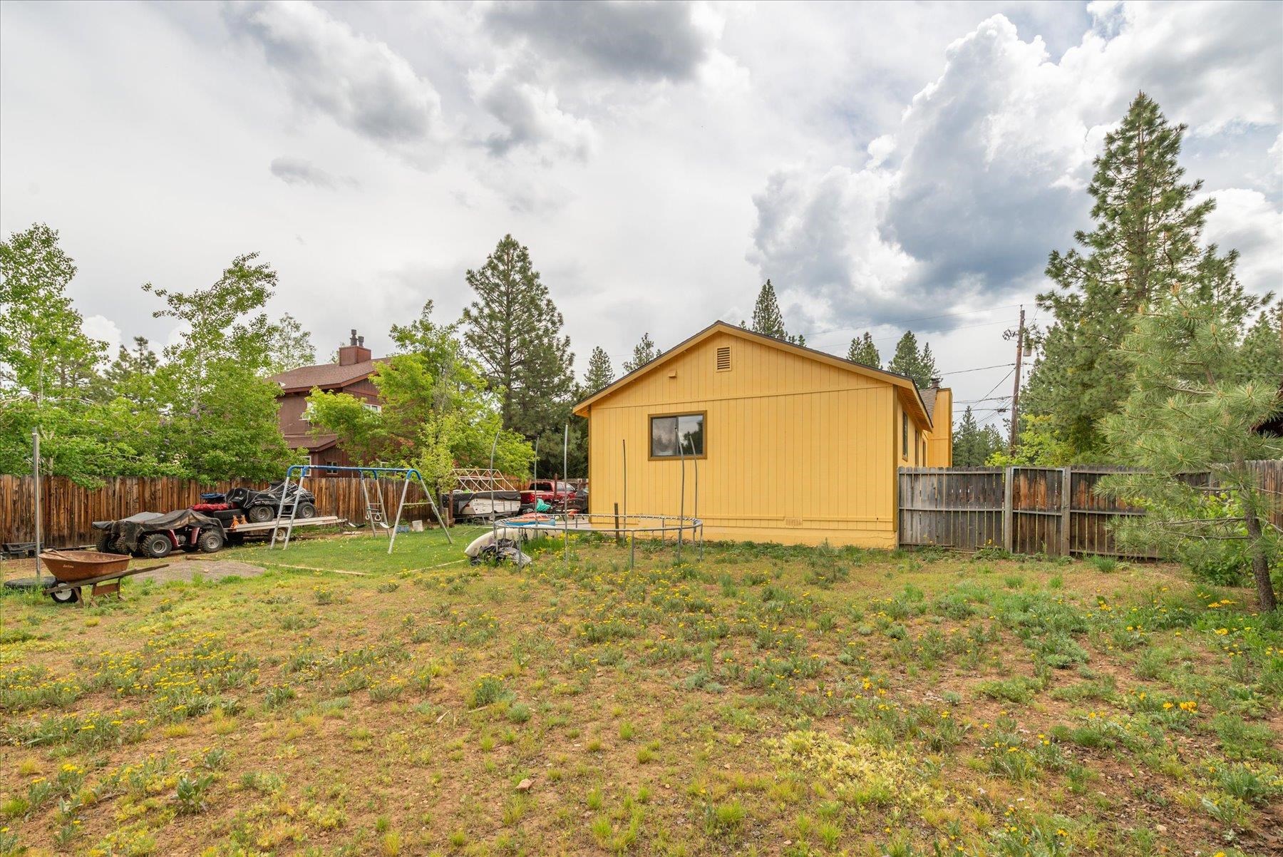 16006 Rolands Way Truckee, CA 96161 - Photo 18 of 19 a view of a outdoor space with garden and trees