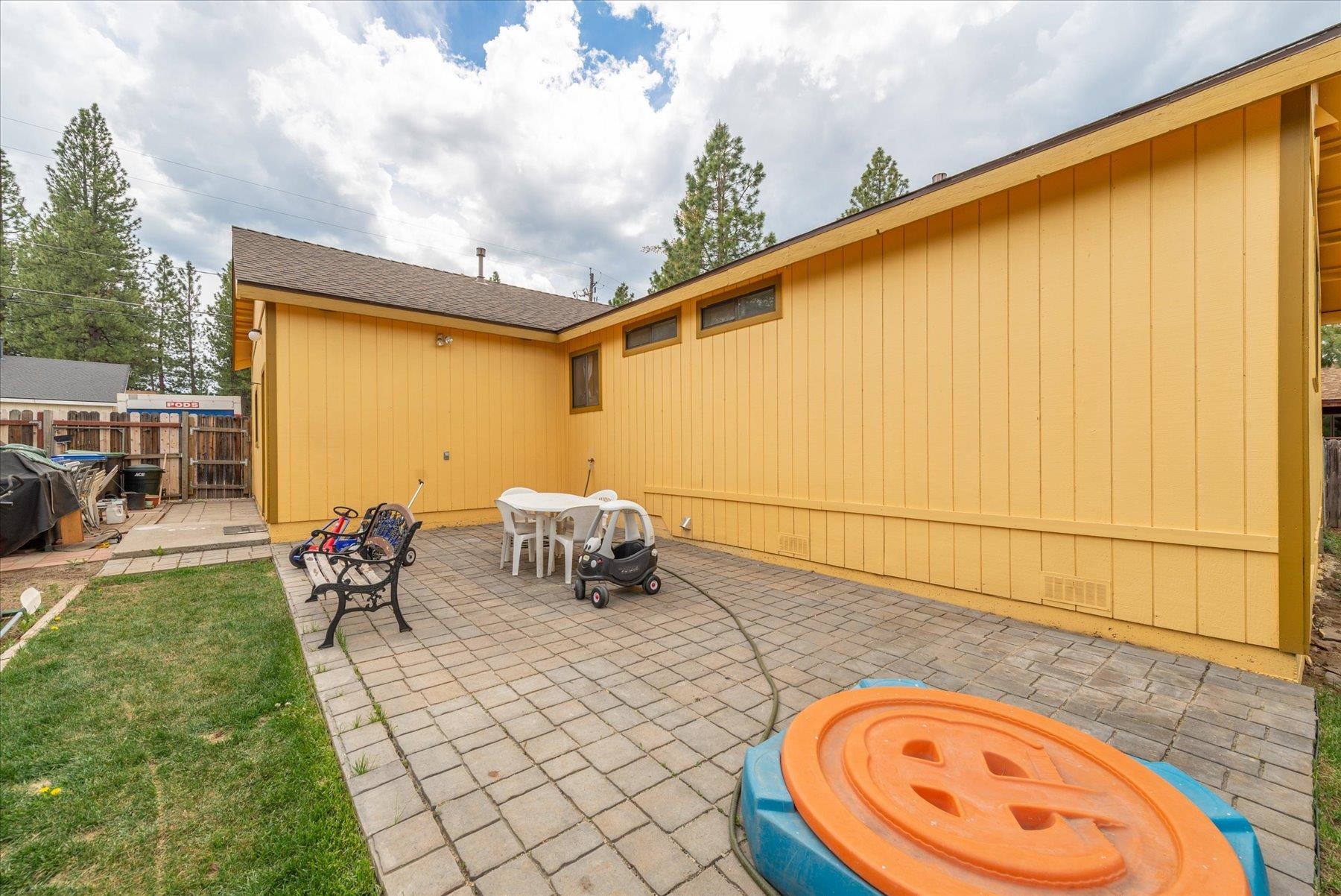 16006 Rolands Way Truckee, CA 96161 - Photo 19 of 19 a backyard of a house with table and chairs