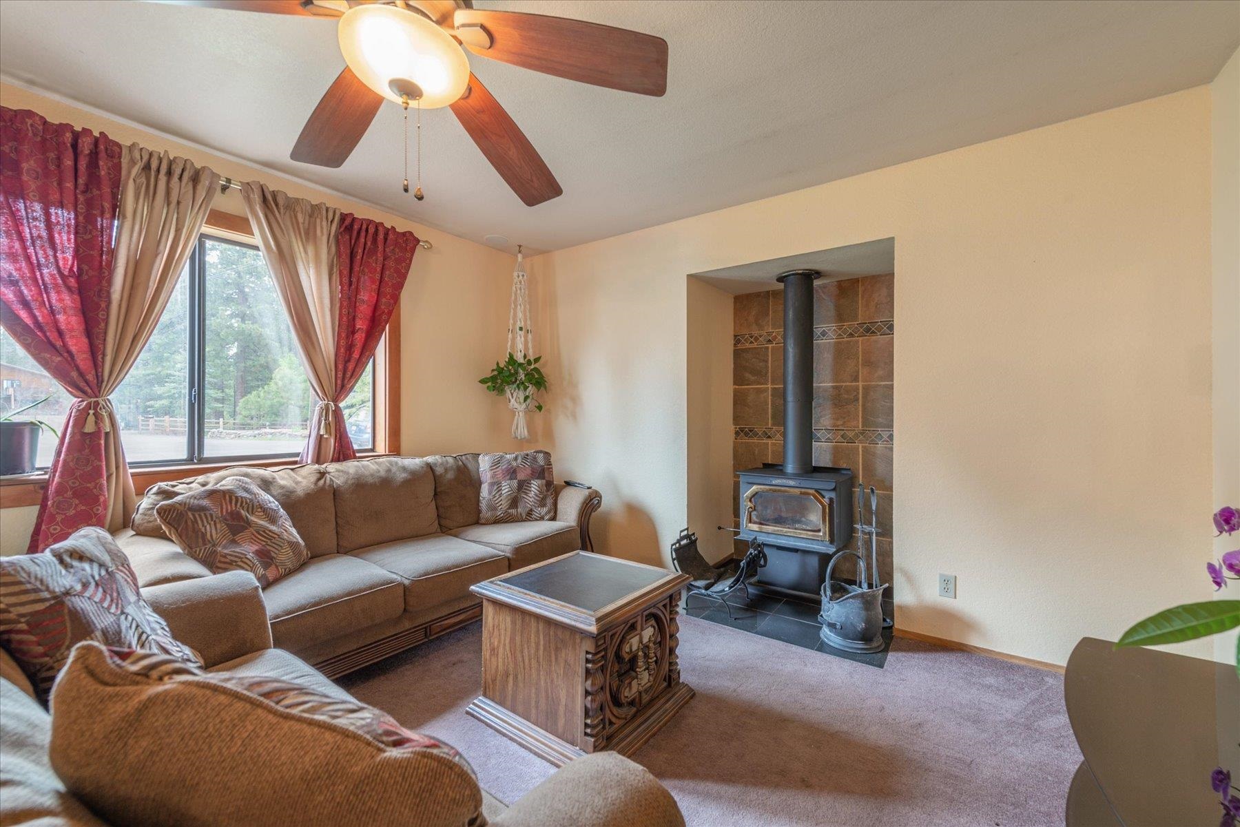 16006 Rolands Way Truckee, CA 96161 - Photo 4 of 19 a living room with furniture and a large window
