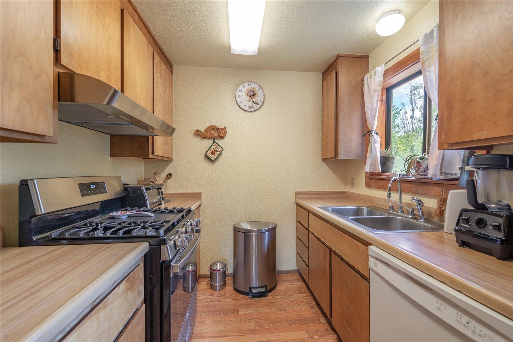 16006 Rolands Way Truckee, CA 96161 - Photo 9 of 19 a kitchen with a stove and a sink