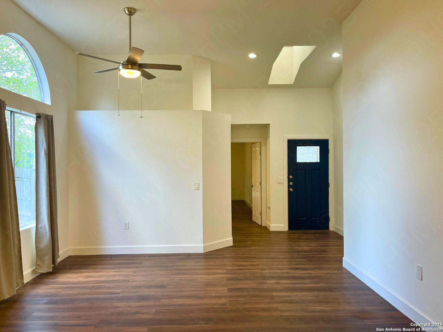 7727 Broken Arrow Converse, TX 78109 - Photo 5 of 17 a view of a hallway with wooden floor