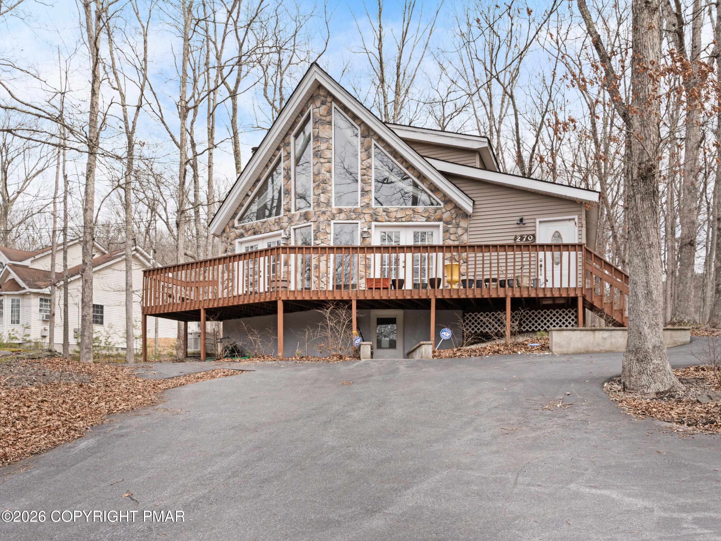 270 Manchester Drive Bushkill, PA 18324 - Photo 2 of 58 a view of a house with a yard and sitting area