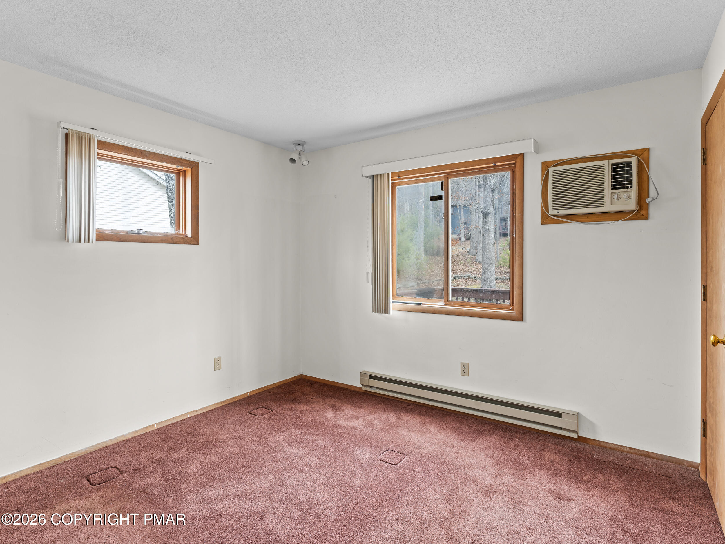 270 Manchester Drive Bushkill, PA 18324 - Photo 25 of 58 a view of an empty room with a window