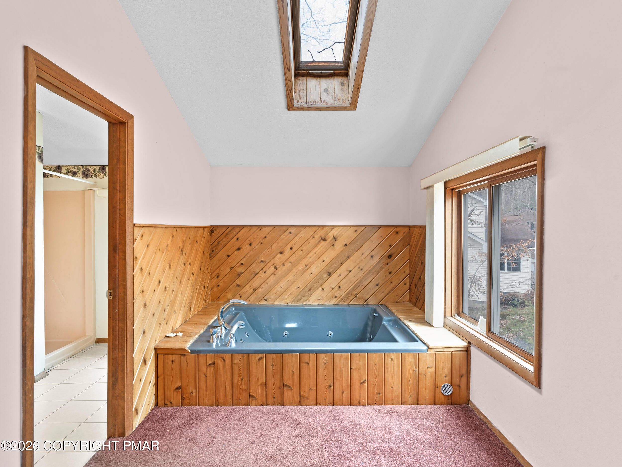 270 Manchester Drive Bushkill, PA 18324 - Photo 36 of 58 a view of a bedroom with wooden floor and a bed