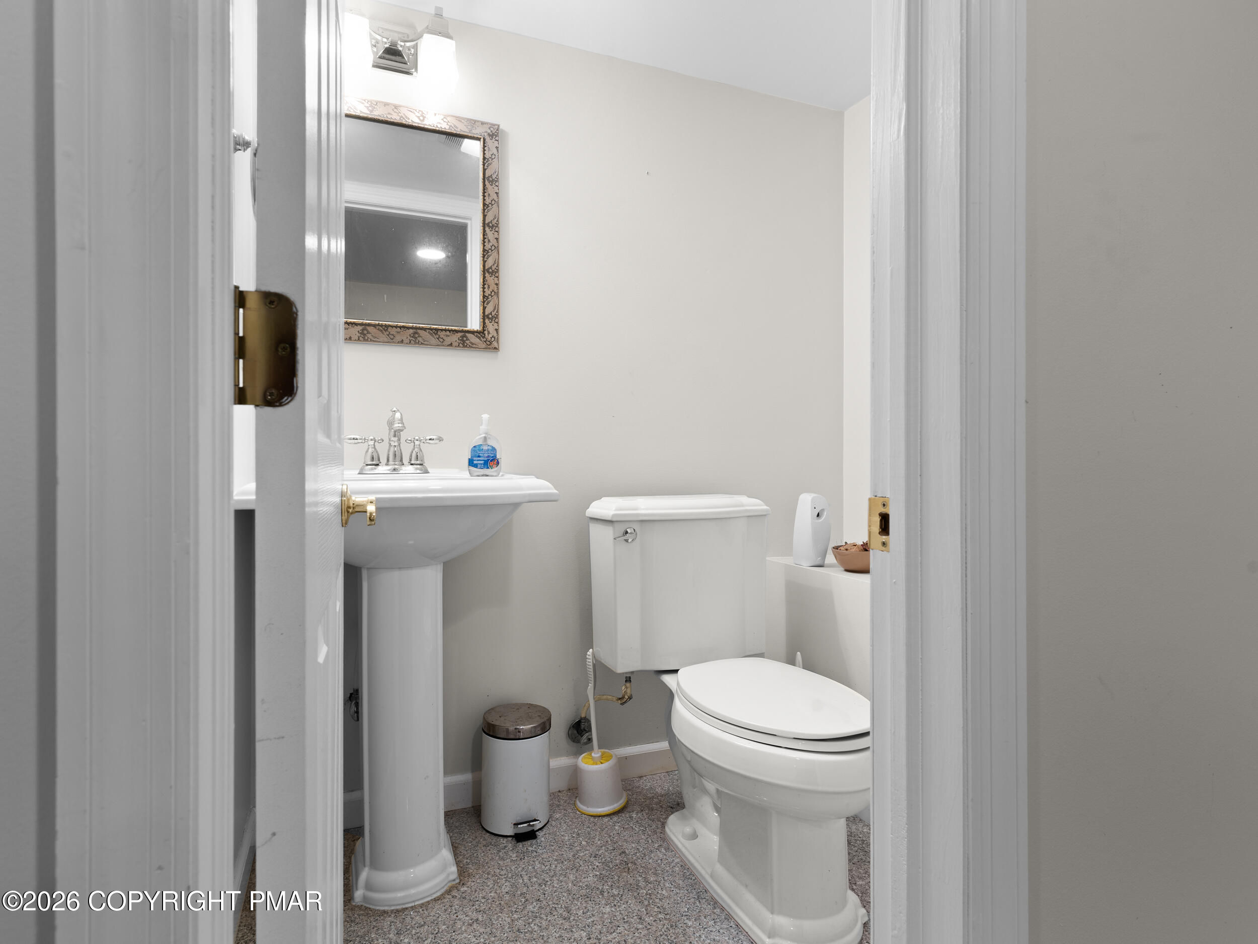 270 Manchester Drive Bushkill, PA 18324 - Photo 42 of 58 a bathroom with a toilet a sink and mirror