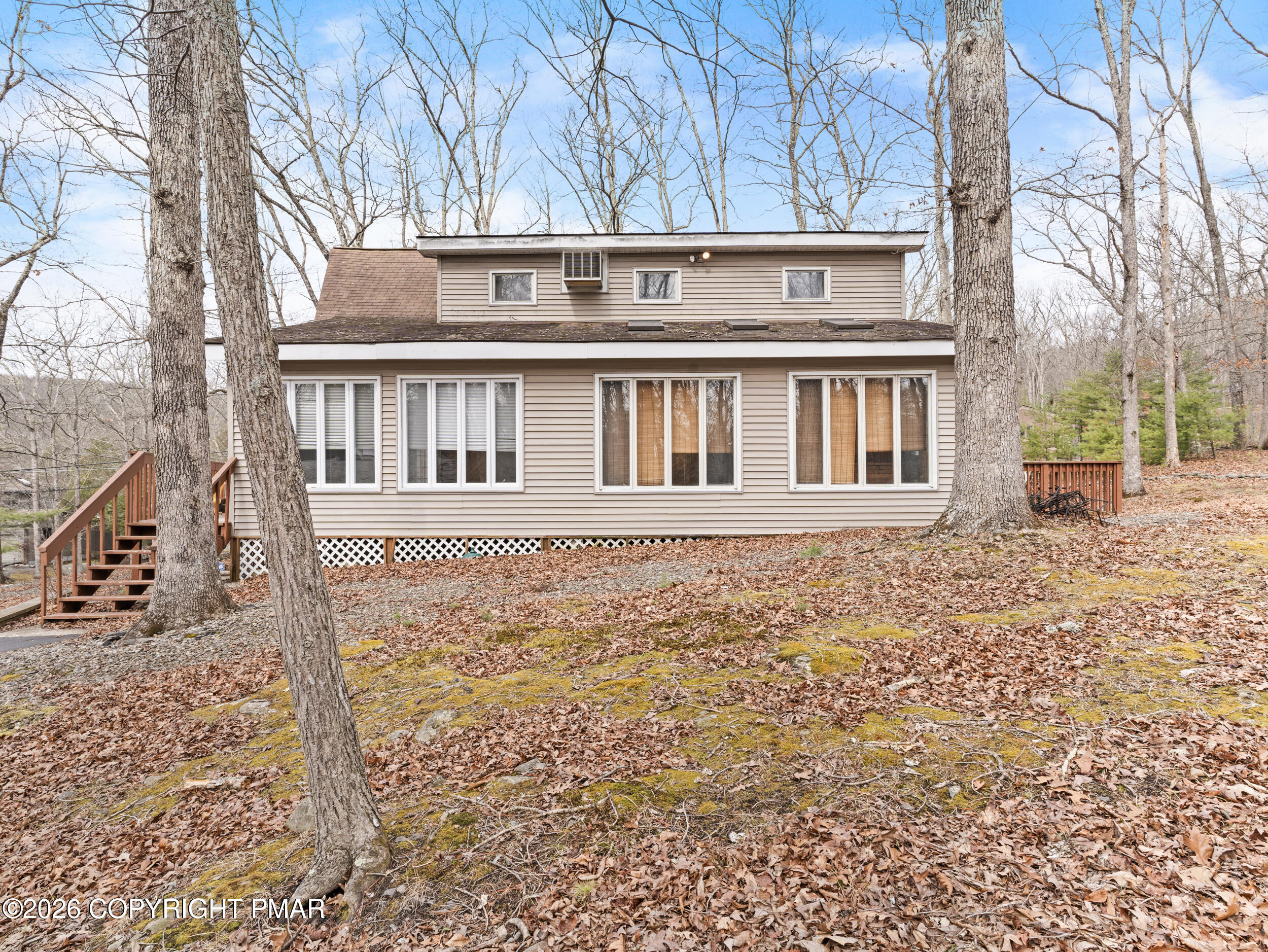 270 Manchester Drive Bushkill, PA 18324 - Photo 7 of 58 front view of a house with a yard