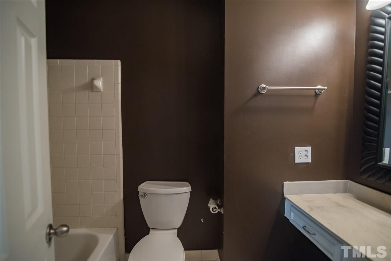 816 Green Ridge Drive Raleigh, NC 27609 - Photo 11 of 14 Guest bathroom provides shower/tub combo!