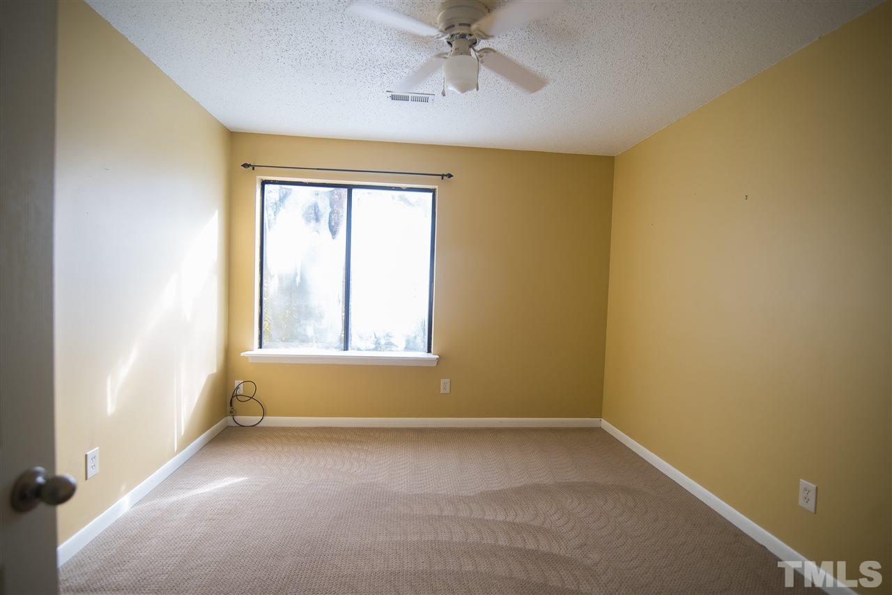 816 Green Ridge Drive Raleigh, NC 27609 - Photo 12 of 14 Spacious bedrooms with great wall space for furniture placement.