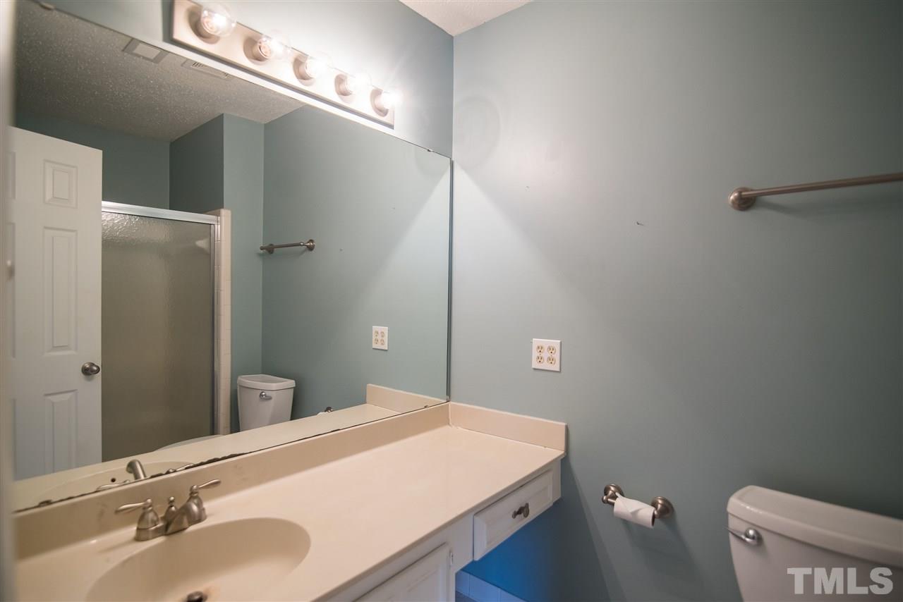 816 Green Ridge Drive Raleigh, NC 27609 - Photo 13 of 14 En suite convenient master bathroom with plenty of counter space!