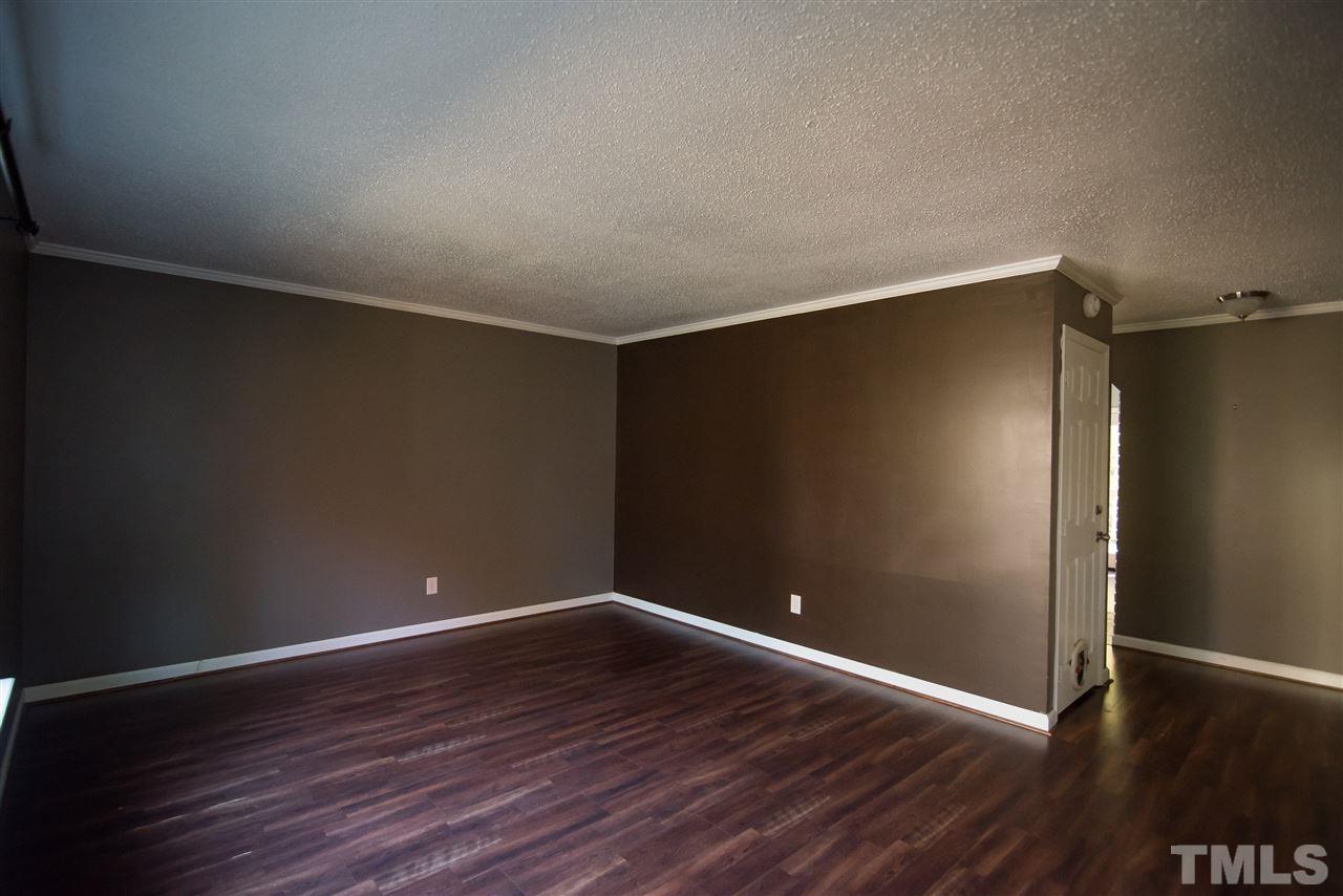 816 Green Ridge Drive Raleigh, NC 27609 - Photo 3 of 14 Hardwood floors throughout on the main level!