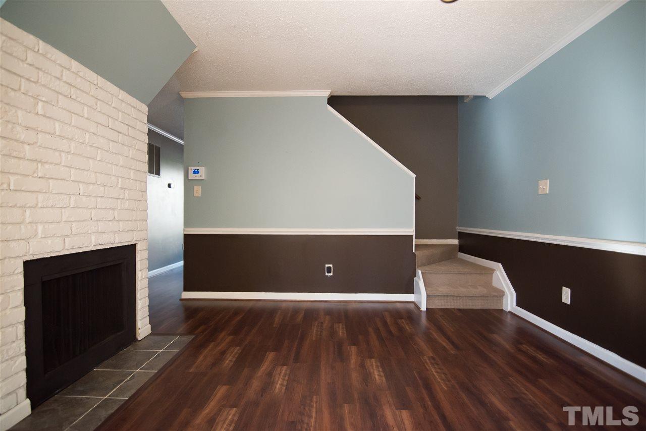 816 Green Ridge Drive Raleigh, NC 27609 - Photo 6 of 14 This dining room also makes for a great den/keeping room with its' cozy wood-burning fire place!