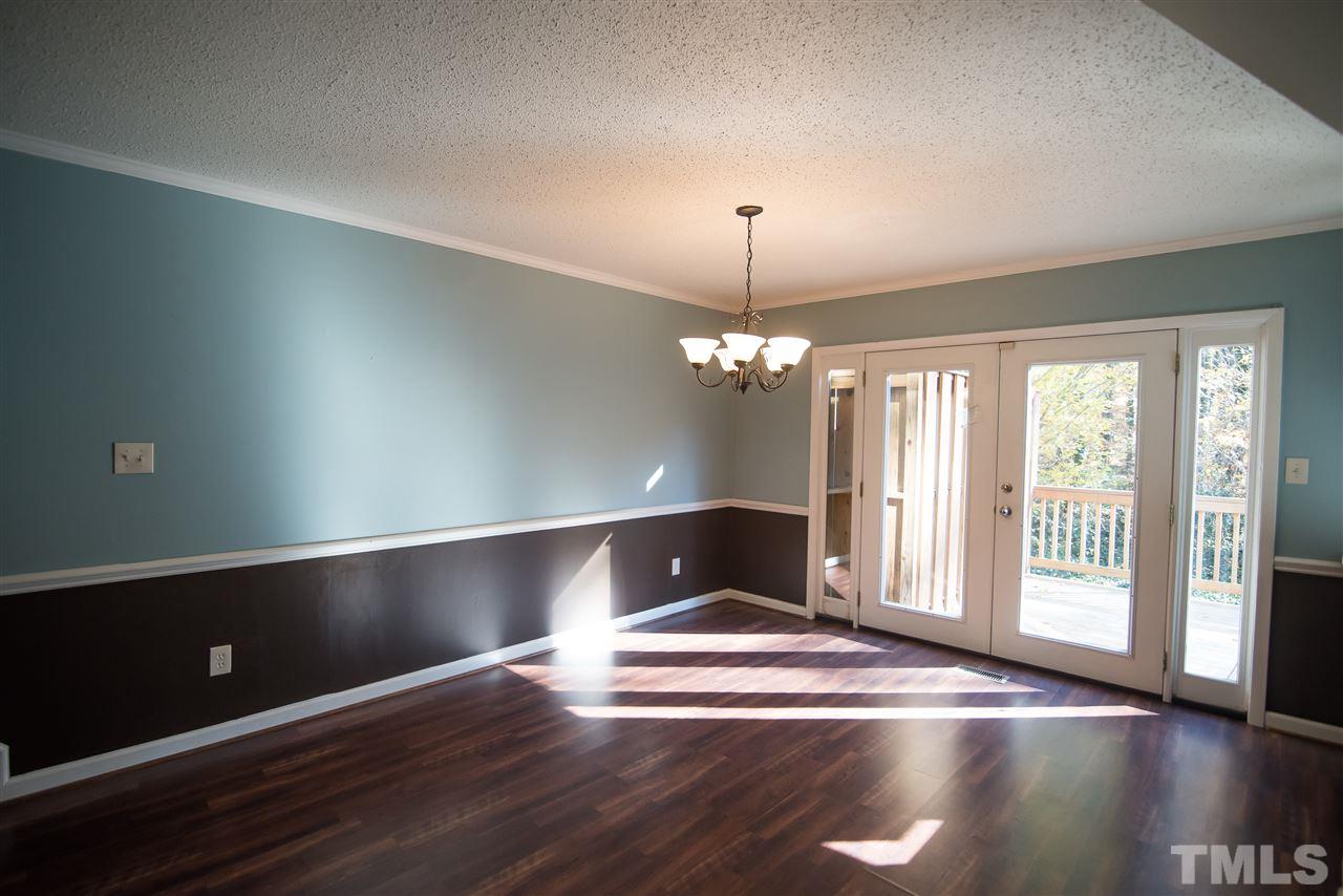 816 Green Ridge Drive Raleigh, NC 27609 - Photo 7 of 14 Enjoy gatherings in the generously-sized dining area.