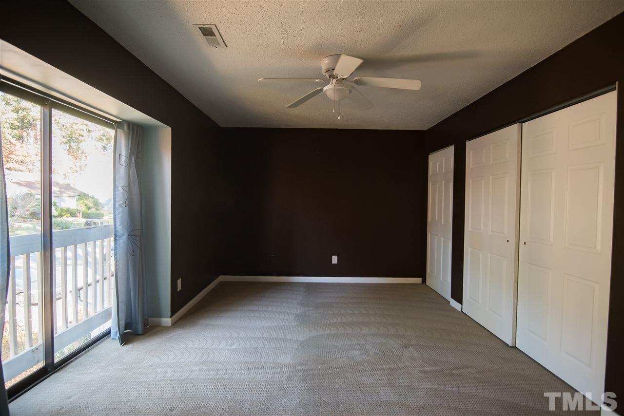 816 Green Ridge Drive Raleigh, NC 27609 - Photo 10 of 14 Light and bright your master bedroom is a perfect retreat! Open your sliding glass doors to let cool breezes flow! The closets are sure to not disappoint!