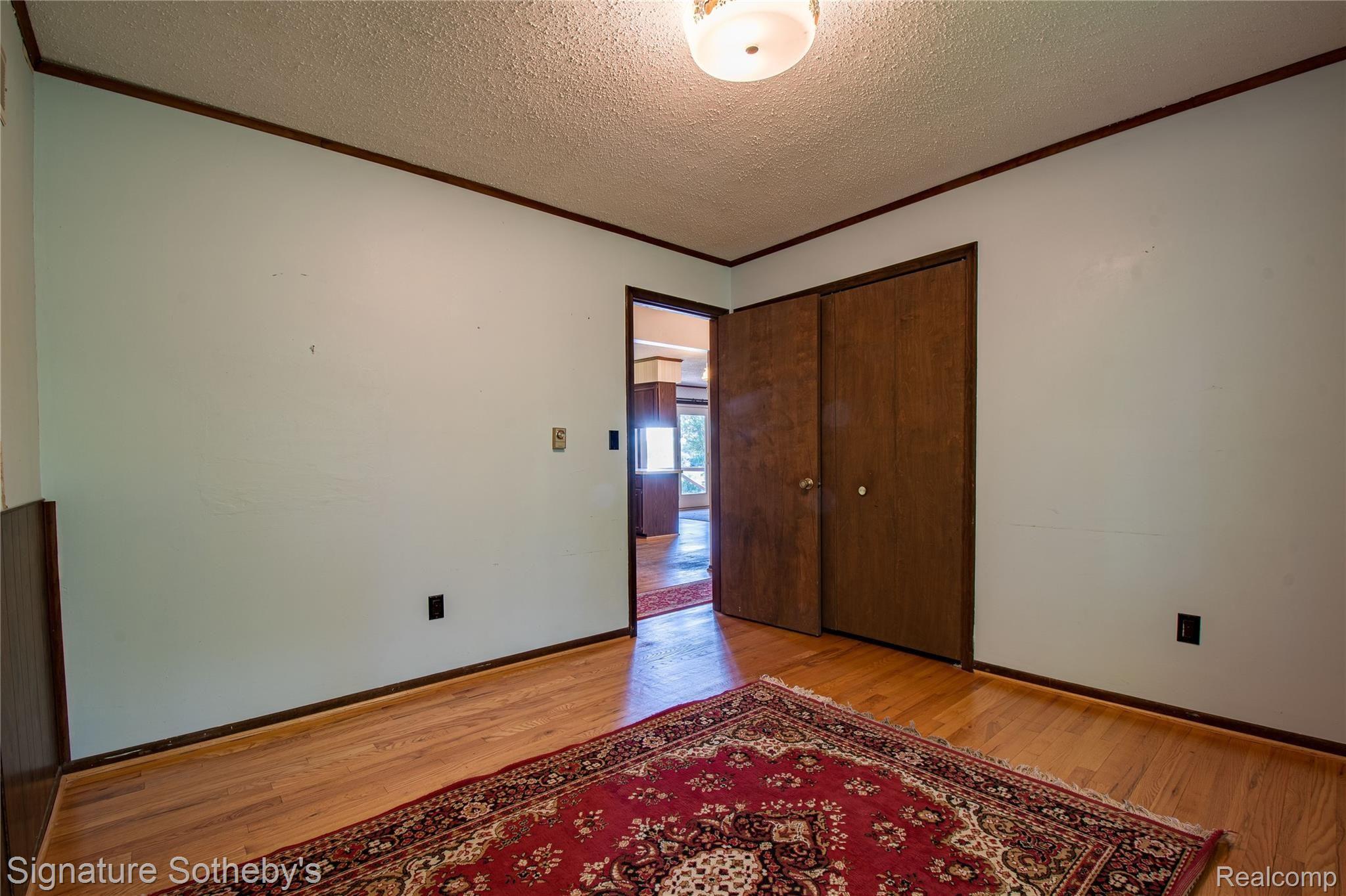 11920 Read Road Fenton, MI 48430 - Photo 10 of 43 Spacious bedrooms with hardwood flooring