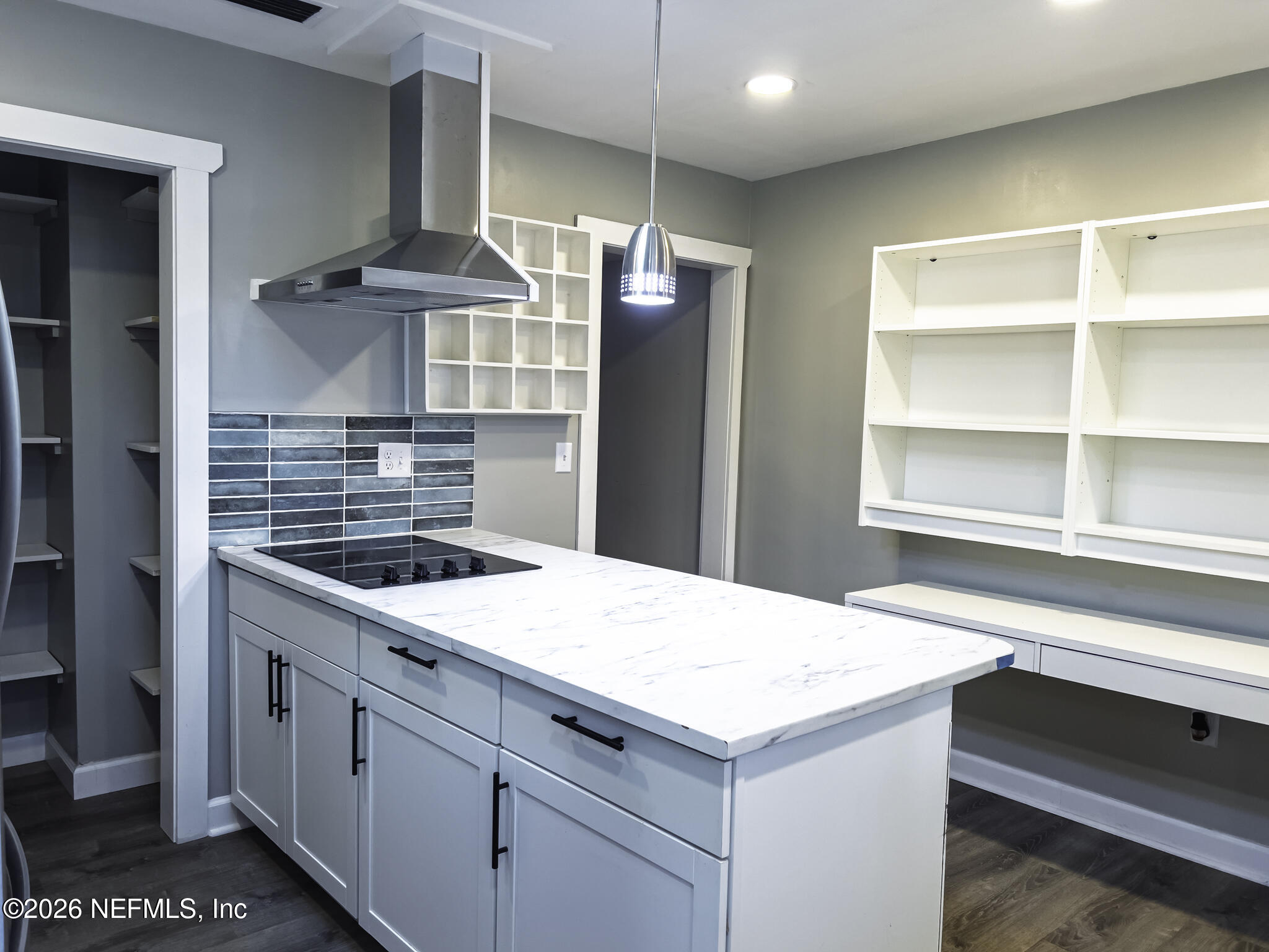 2085 Mills Road Jacksonville, FL 32216 - Photo 2 of 13 a kitchen with a stove and a sink