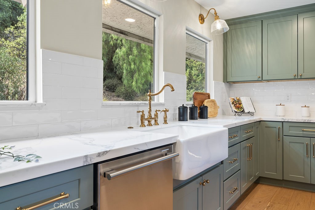 275 Fairview Road Ojai, CA 93023 - Photo 12 of 74 a kitchen with a sink cabinets and window