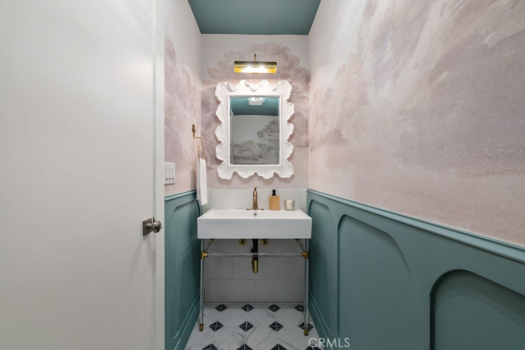275 Fairview Road Ojai, CA 93023 - Photo 29 of 74 a bathroom with a sink a toilet and mirror