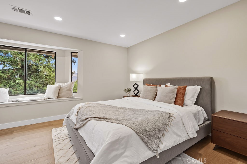 275 Fairview Road Ojai, CA 93023 - Photo 31 of 74 a large bed sitting in a bedroom next to a window