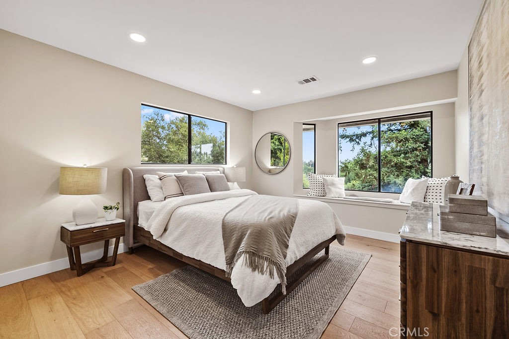 275 Fairview Road Ojai, CA 93023 - Photo 33 of 74 a bedroom with a bed and a large window