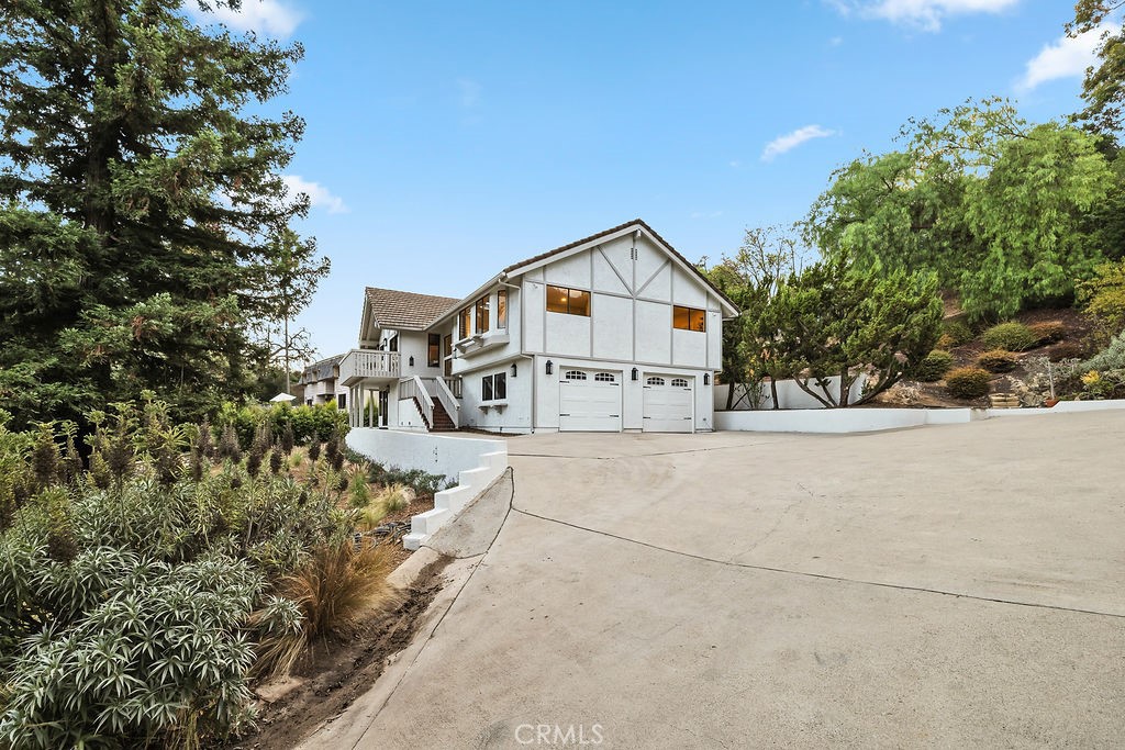 275 Fairview Road Ojai, CA 93023 - Photo 65 of 74 a view of a house with a yard and large trees