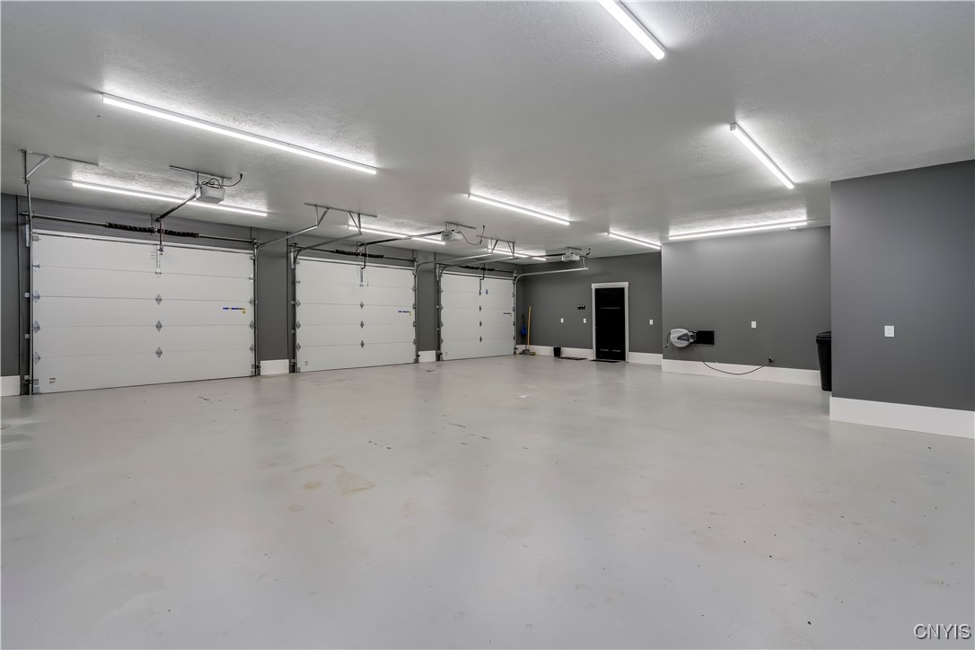 23610 Fetterly Road Brownville, NY 13634 - Photo 36 of 50 3 stall heated garage