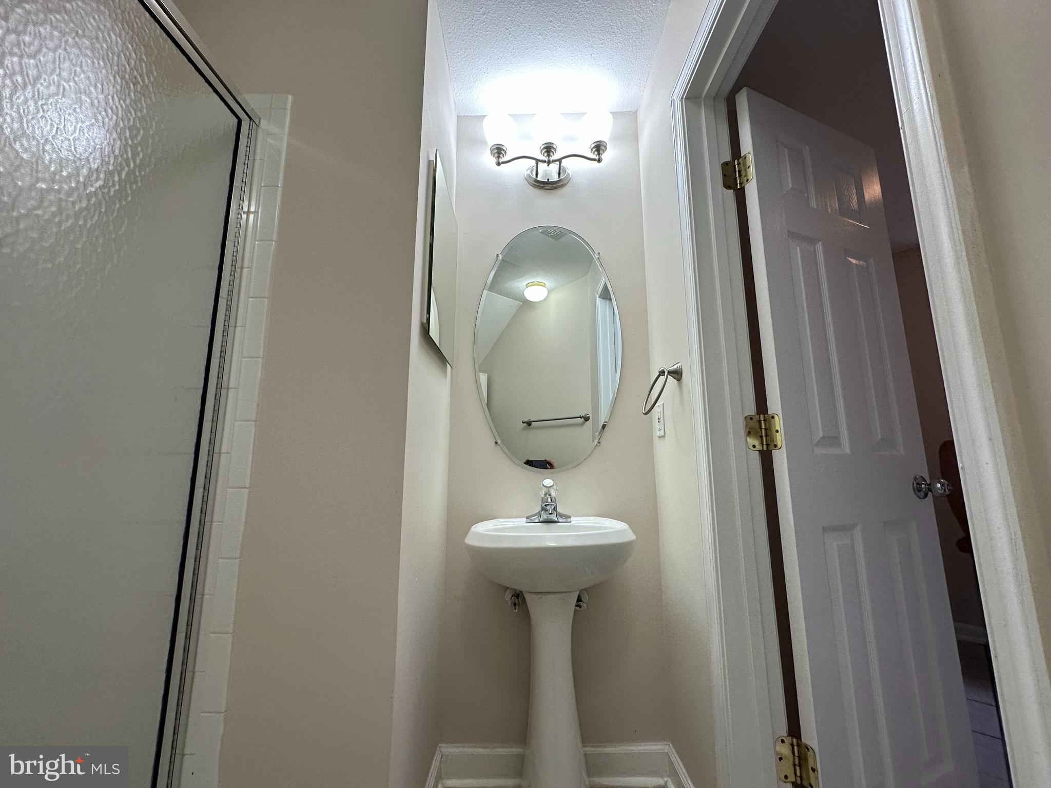 21798 Jarvis Square Ashburn, VA 20147 - Photo 12 of 29 a bathroom with a sink and a mirror