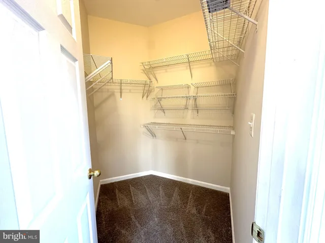 a view of a balcony with wooden floor